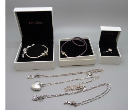 Pandora jewellery; charm bracelet, ring and three chains with pendants 
