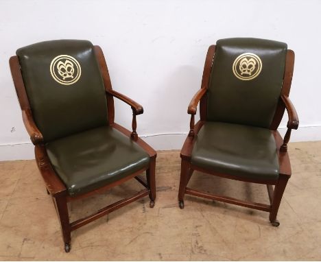 A pair of 19th century mahogany office arm chairs having green leather back support arm rest and seat, with MM initials impri