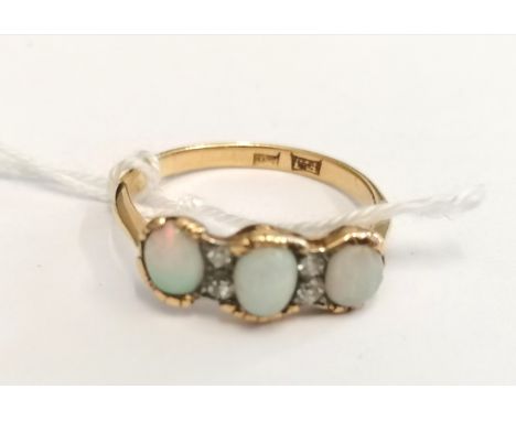 18ct seven stone precious opal and diamond ring c1890