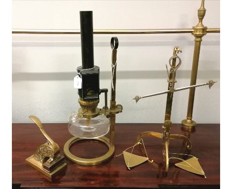 A Hinks and Son of Birmingham adjustable oil lamp together with a set of brass scales and a brass stamp