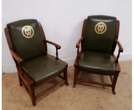 A pair of 19th century mahogany office arm chairs having green leather back support arm rest and seat, with MM initials impri