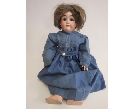 A Max Handwerck bisque socket head doll, with brown glass sleeping eyes, open mouth with teeth, brown wig, composition and wo