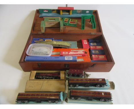 Hornby Dublo Trains comprising Duchess of Atholl, three L.M.S. D3 coaches, well wagon, Esso tanker, two mineral wagons, coal 