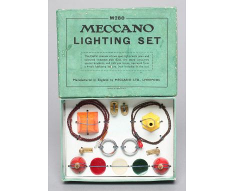 Meccano Lighting Set, boxed, strung onto card, G-E, and a Meccano Guild badge (Est. plus 21% premium inc. VAT)