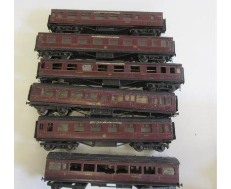 Six O gauge coarse scale three rail coaches, three being of wooden construction by C.B. Smith, two Leeds and one Exley, rusti