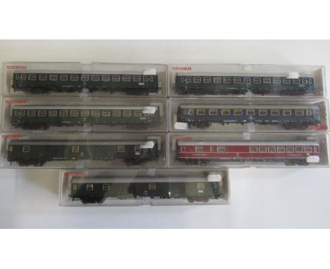 Seven Fleischmann D.B. coaches, six fitted with interior lights, box G-E (Est. plus 21% premium inc. VAT)