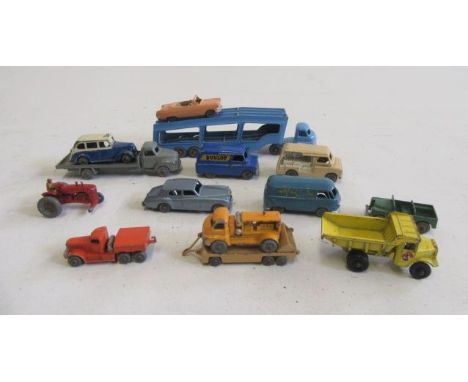 Nine Matchbox vehicles including car transporter, milk van, Dunlop van and Rolls Royce together with a Dublo Dinky Taxi and B