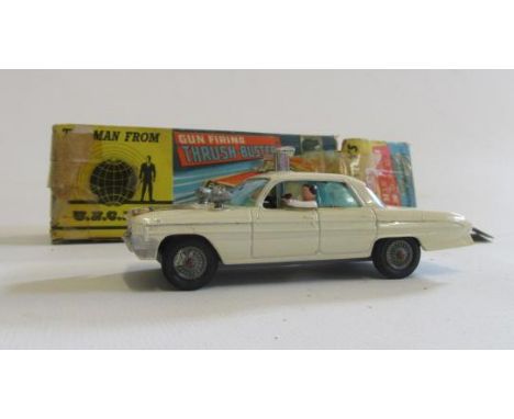 Corgi 497 Thrush Buster UNCLE car finished in white, missing Waverley Ring, box P, vehicle F-G (Est. plus 21% premium inc. VA