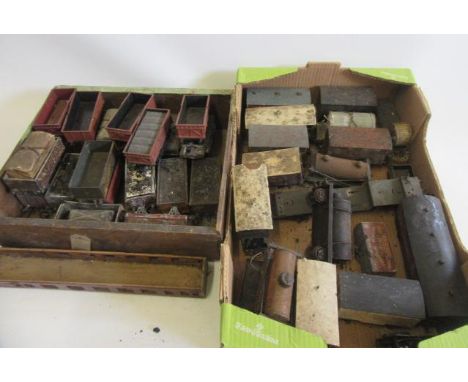 A large quantity of playworn coarse scale three rail O gauge goods wagons by various makers and home built by C.B. Smith, mos