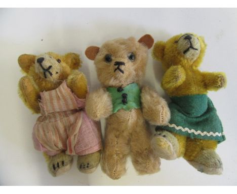 A 5" pre-war Chad Valley teddy, with felt ears, felt waistcoat and label to inner leg, together with two 4 1/2" German teddie