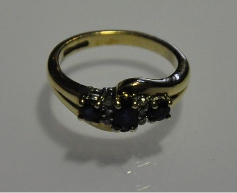 A 9ct gold sapphire and diamond five stone dress ring