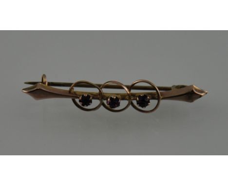 A 9ct gold and amethyst bar brooch