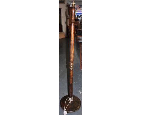 A turned beech standard lamp