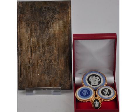 A Wedgwood oval black basalt ring in yellow metal band marked 375, together with 3 similar brooches and an engine turned silv