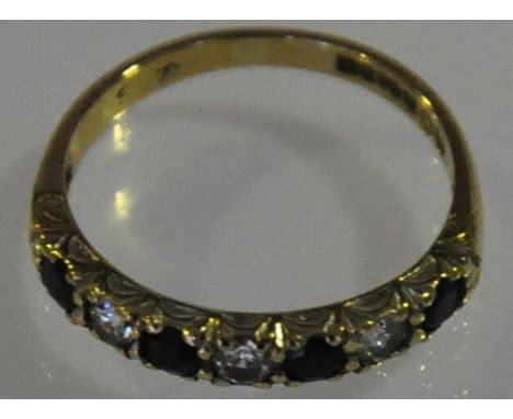 A 9ct gold seven stone sapphire and diamond half eternity ring