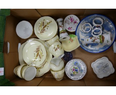 A mixed collection of items to include: Adderley Harvest theme tea set, Carltonware dish, floral napkin rings etc 