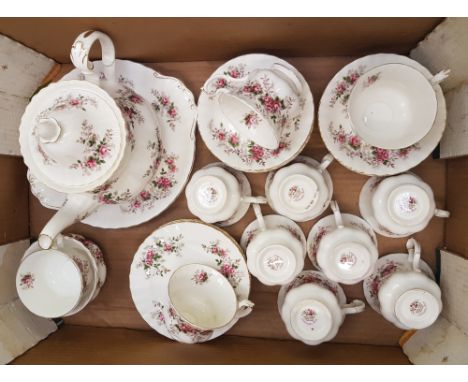 Royal Albert Lavender Rose tea ware items: teapot, sugar, 6 side plates, 11 tea cups, 12 saucers and 1 sandwich plate (32). 