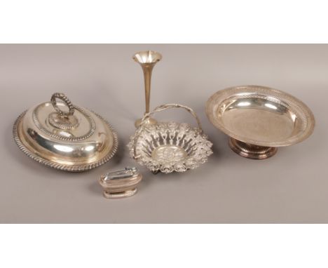 A continental white metal pierced swing handle basket, silver plated entree dish, Ronson lighter and other plate.