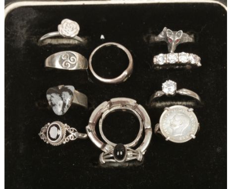 A silver Pandora ring and 11 other silver dress rings.