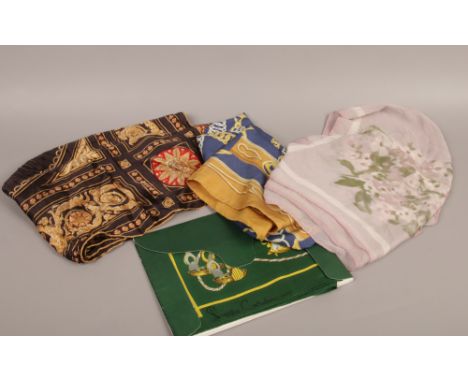 Four designer silk scarves to include Hermes, Italian Valentino, Buckingham Palace design from The White Room and a Pierre Ca