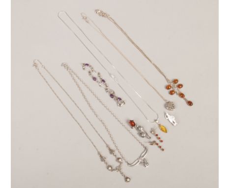 A tray of silver jewellery including amber and amethyst set examples.