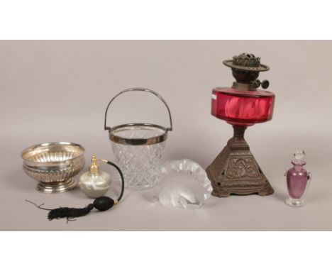 A group of collectables to include Victorian oil lamp, Jonasson paperweight, silver plate bowl etc.Condition report intended 