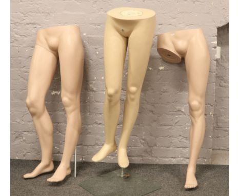 Three shop mannequin lower torso.