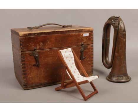 A white star line copper bugle by R. J. Ward &amp; Sons Liverpool in wooden box and a miniature deck chair.