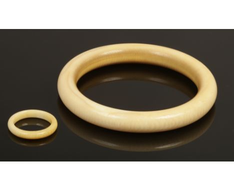 A ivory bangle and matching ring.