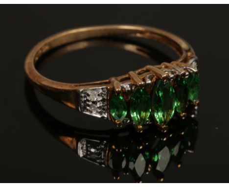 A 9ct gold tsavorite garnet and diamond ring with certificate, size O.