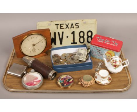 A tray of collectables to include pre decimal coins and bank notes, Texas tin number plate, Jack Daniels hip flask, Old Count