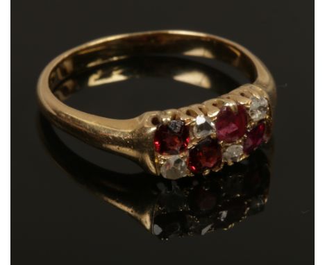 A vintage rose cut diamond and red gem two row dress ring, size Q1/2.