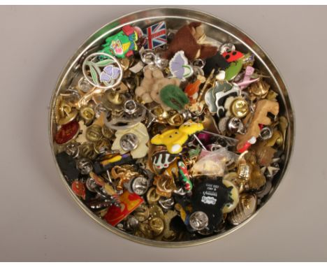 A large quantity of mostly enamel pin badges including Guinness, McDonalds, animal themed etc.