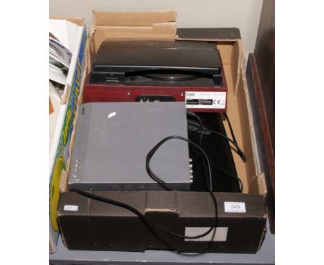 Two record turntables along with a DVD player.