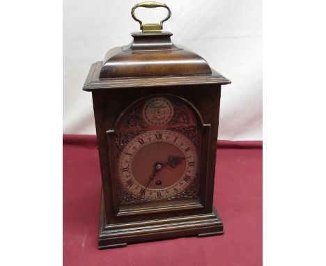 Geo.I style walnut cased bracket timepiece, caddy top with brass handle, glazed break arched panel door enclosing brass Roman