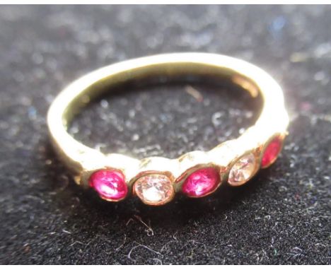 Hallmarked 18ct yellow gold diamond and ruby half eternity ring size K, 2.5g 