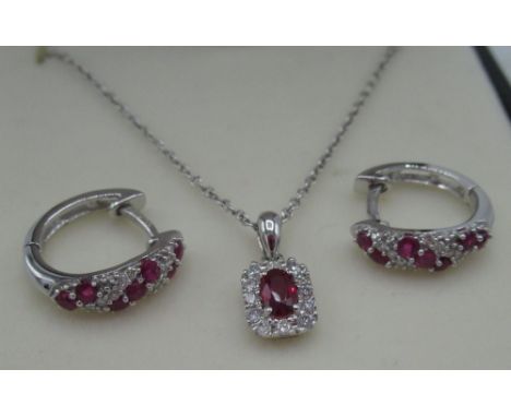 9ct white gold ruby and diamond hoop earrings inset with seven rubies and ten round cut diamonds and a pair of 9ct white gold