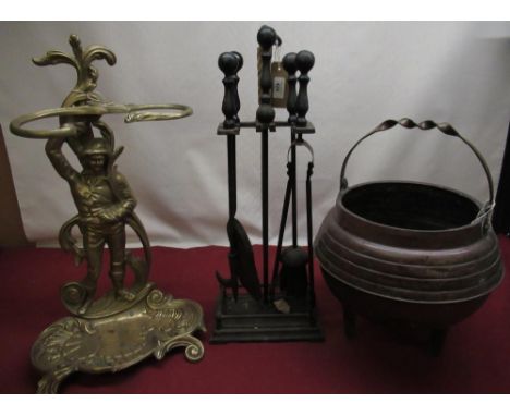 C20th ironwork four piece companion set on stand, late C20th brass stick stand in Art Nouveau style, copper and brass cooking