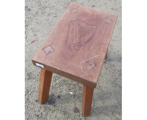 Yorkshire Oak Derek Slater Fishman style stool, rectangular top carved with harp, on four square outsplayed legs, with signat