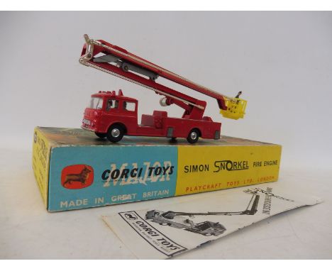 A boxed Corgi 1127 Simon Snorkel Fire Engine.