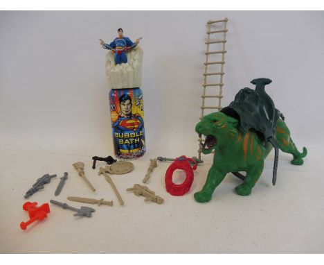 A tray of He Man characters to include Panther including saddle and strap, weapons and ladder fro Castle Greyskull etc.