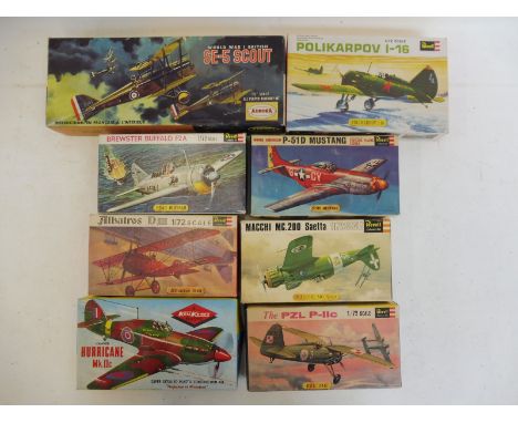 Eight assorted 1/72 scale model kits, including Revell, not checked.