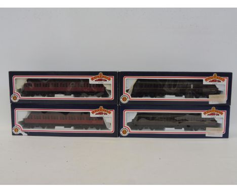 Four boxed Bachmann Branch-Line 57' B.R. Mk.I Suburban coaches.