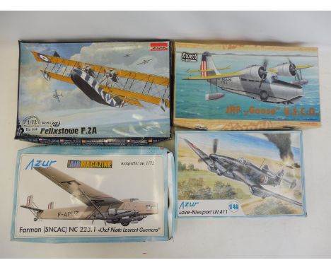 Four assorted fighter aircraft kits, 1/48 and 1/72 scale.