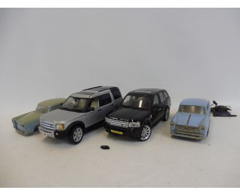 An RC2 Britains large scale model of a Range Rover and another of a Land Rover Discovery, a boxed Minichamps Aston Martin DB9