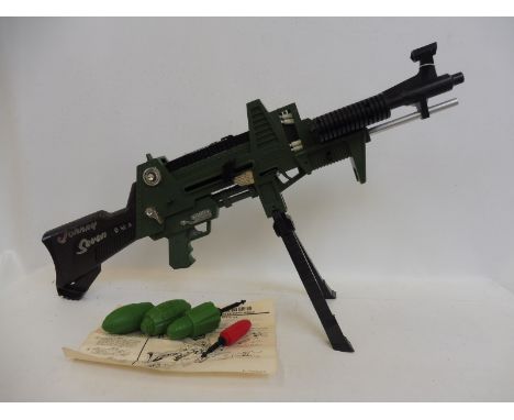 A Johnny Seven 'One Man Army' gun by Topper, complete with missiles, with inner box and trade packaging.