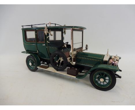 A Franklin Mint scale model of a 1907 Rolls-Royce Silver Ghost.