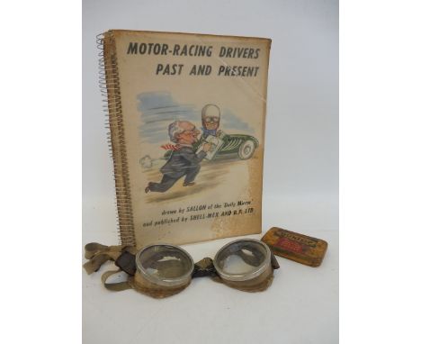 A single volume Motor-Racing Drivers Past and Present, a pair of motorcycle goggles and a Dunlop Midget Repair Outfit tin.
