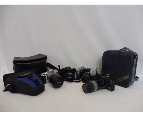 A Canon T70 camera and lens, a Minolta 404si camera and lens, a Vivita V6000 and a Praktica B.C.A.