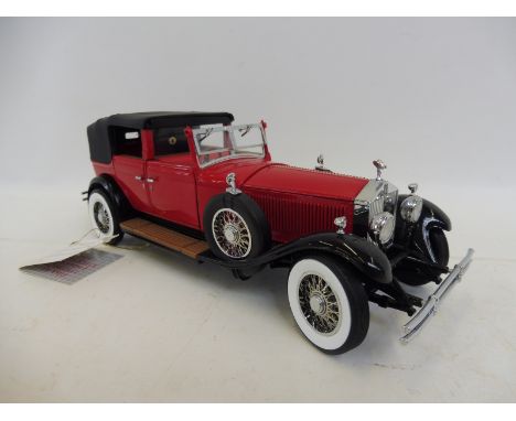 A Franklin Mint scale model of a 1929 Rolls-Royce Phantom I Cabriolet De Ville.